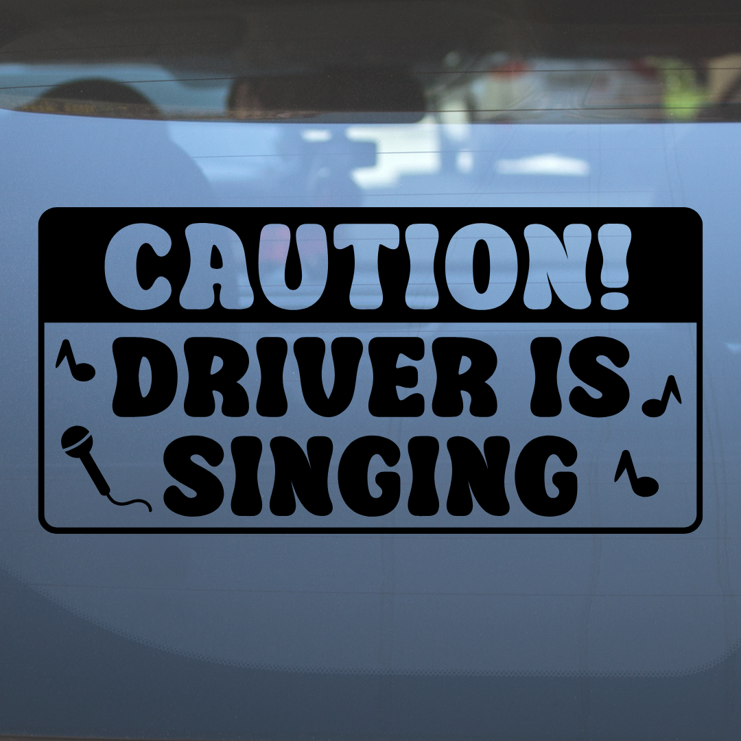 Caution! Driver Is Singing – Vinyl Decal – Car Decal, Truck Decal, Van Decal & More!